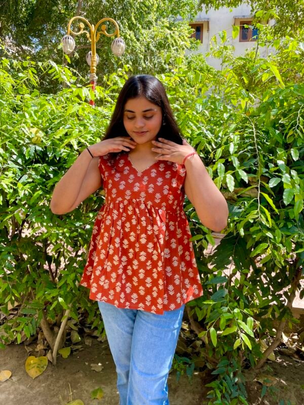 Serenia Orange Peplum Top